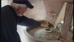 Mlinski kamen oko vrata 