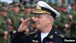 Vice Admiral Viktor Sokolov salutes during a send-off ceremony for reservists drafted during partial mobilization in Sevastopol, Crimea, Russian-occupied Ukraine, on September 27, 2022. 