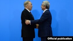 Kazakhstan - President Nursultan Nazarbayev greets his Armenian counterpart Serzh Sarkisian at the Eurasian Union summit in Astana, 29May2014.