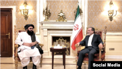 امیرخان متقي او عباس عراقچي