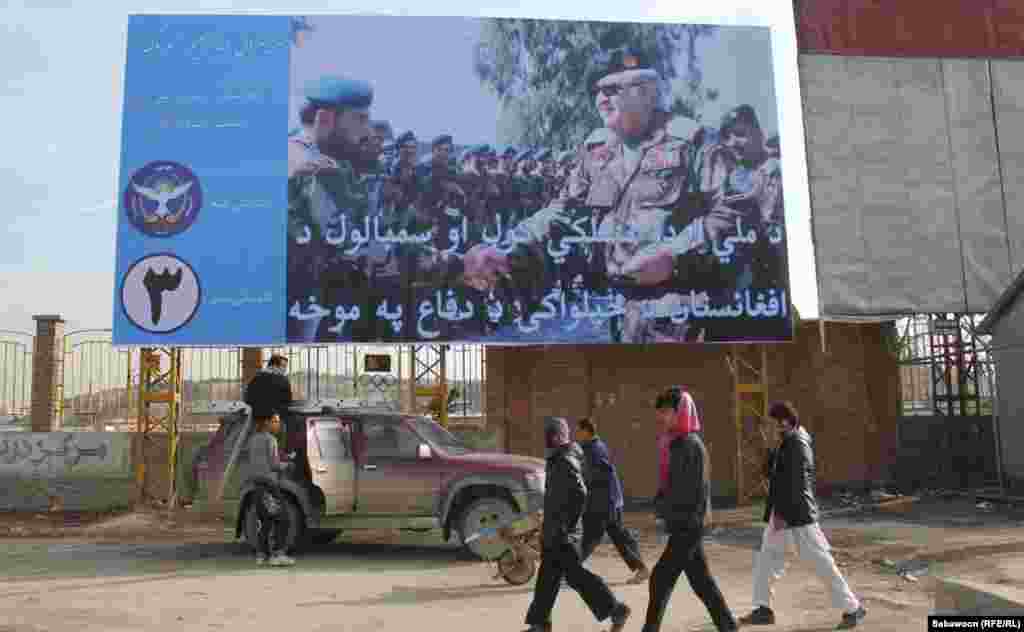 Former Afghan Defense Minister General Abdul Rahim Wardak displays his military background to lure voters.