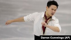 Typmak boýunça figuraçy sportsmen Denis Ten