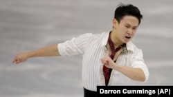 Denis Ten of Kazakhstan competes in the men's figure-skating final during the 2014 Winter Olympics in Sochi, Russia.