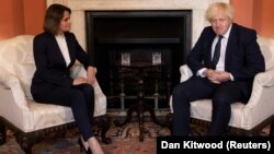 British Prime Minister Boris Johnson meets with Belarusian opposition leader Svyatlana Tsikhanouskaya at 10 Downing Street in London on August 3. She said Johnson is "a person who really shares common values with Belarusians."