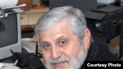 Александр Славутский