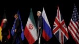 وزراء الخارجية الأميركي والبريطاني والإيراني جون كيري وفيليب هاموند وجواد ظريف إثر إعلان الاتفاق - فيينا 14 تموز 2015