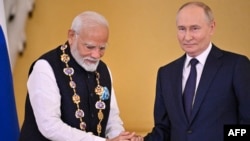 Kryeministri i Indisë, Narendra Modi, dhe presidenti rus, Vladimir Putin. 9 korrik 2024. 