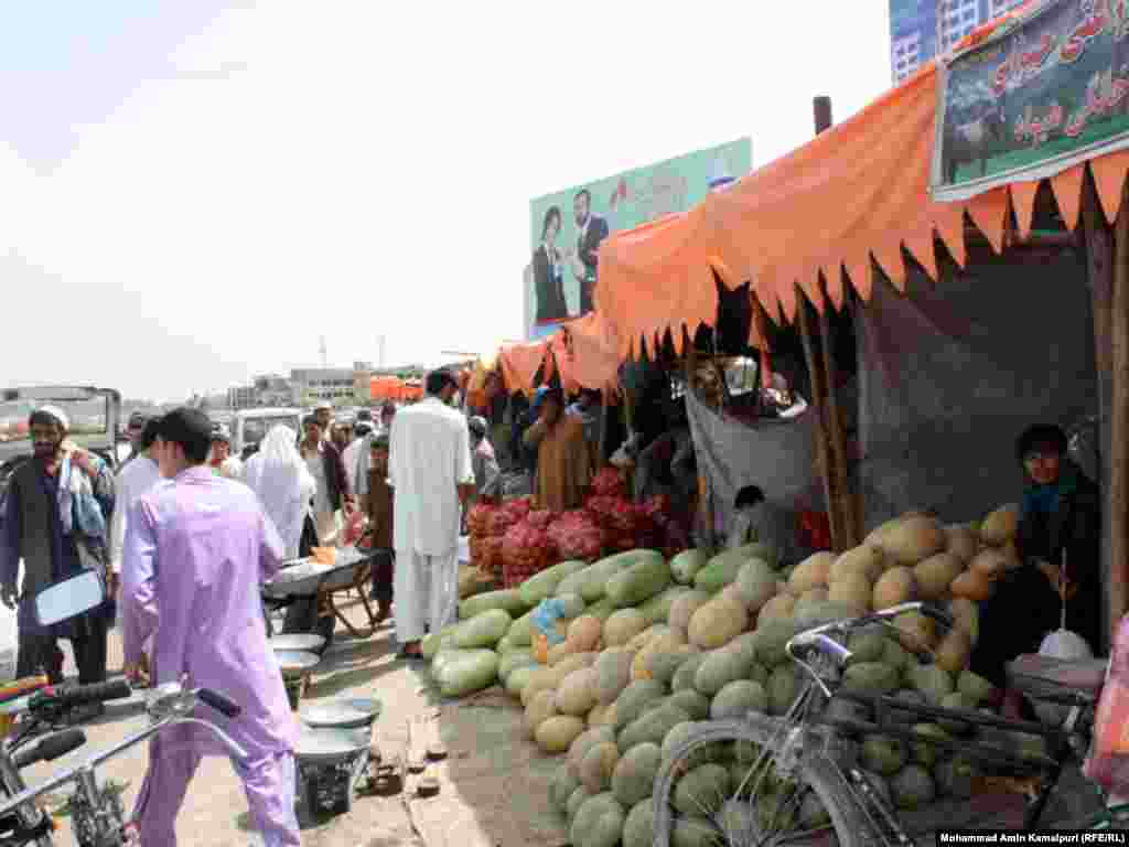Afghanistan, Kabul—Afghan sellers sells watermelons and melons during Eid day in Kabul Markets (froshgah), 29August2011