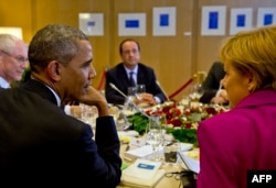 Франсуа Олланд на встрече лидеров стран "Большой семерки". 4 мая 2014 года
