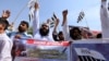 Supporters of the Jamaat-ud-Dawa Islamic organization attend an anti-U.S. protest against a drone strike in Islamabad in May 2016.