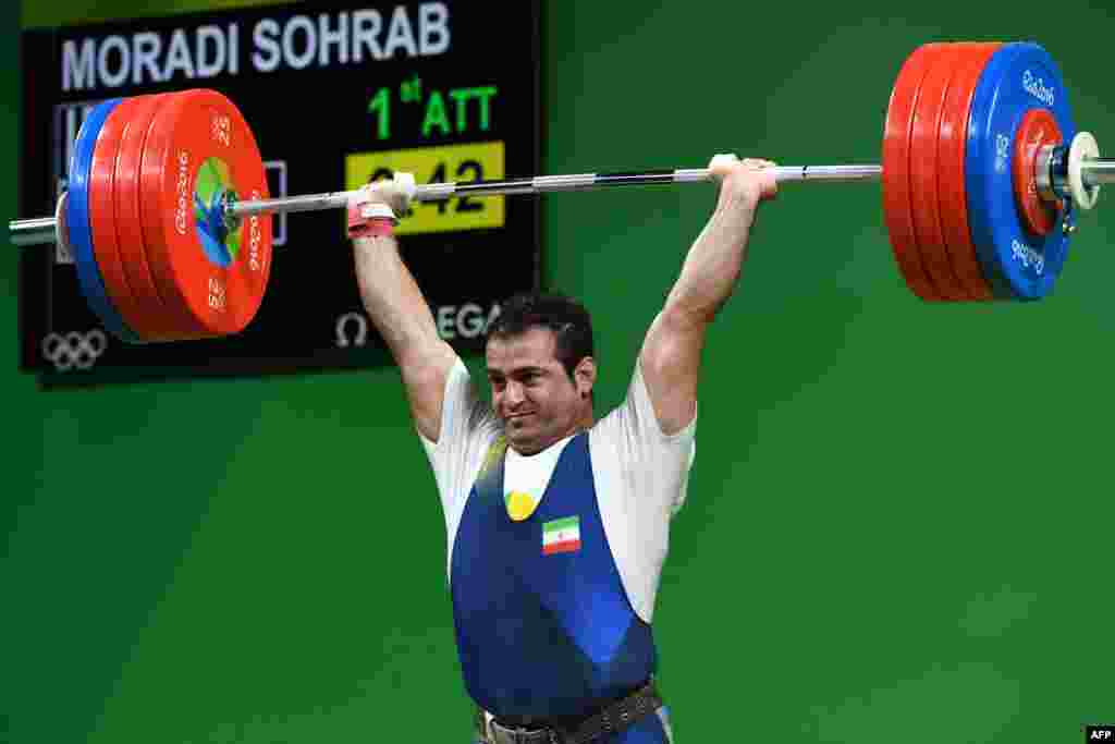 Iran's Sohrab Moradi competes during the men's weightlifting 94-kilogram event.