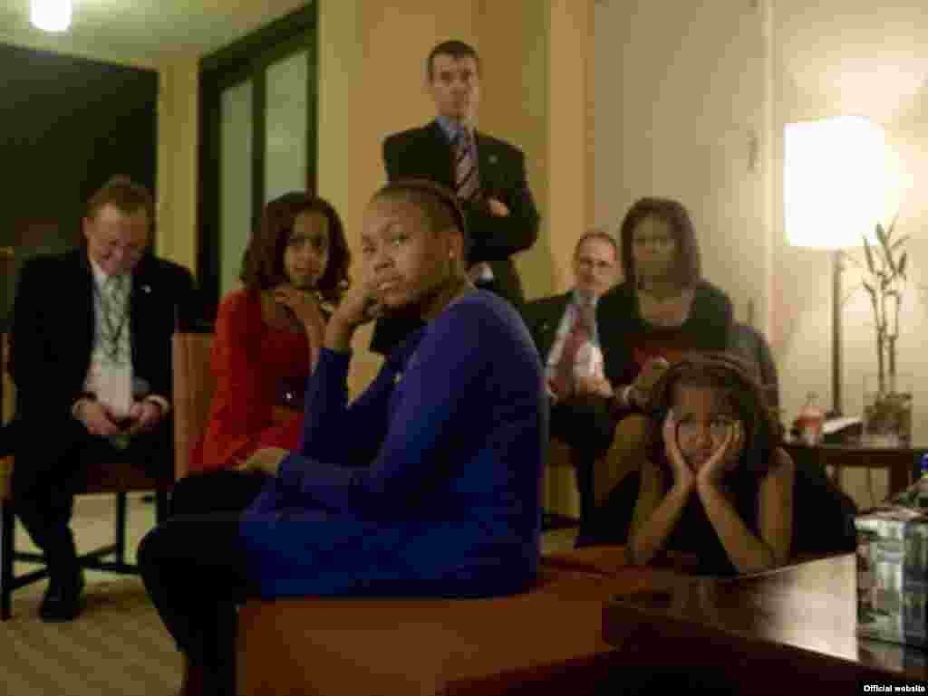 U.S. President-elect Barack Obama and his family watch the results come in on election night in Chicago on November 5. - obama10