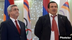 Armenia - President Serzh Sarkisian (L) and Prosperous Armenia Party leader Gagik Tsarukian at an awards ceremony organied by the National Olympic Committee near Yerevan, 26Dec2012.