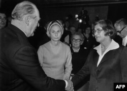 Bonner meets King Olaf V of Norway while receiving the Nobel Prize on her husband's behalf in Oslo in 1975. Describing Sakharov in its citation as "the conscience of mankind," the Nobel Committee said that he had "fought not only against the abuse of power and violations of human dignity in all its forms, but has in equal vigor fought for the ideal of a state founded on the principle of justice for all."