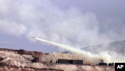 Turkish artillery fires toward Kurdish positions in Syria's Afrin Province earlier this month.