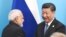 FILE: India's Prime Minister Narendra Modi shakes hands with Chinese President Xi Jinping during a signing ceremony at the Shanghai Cooperation Organization (SCO) summit in Qingdao, China in June 2018.