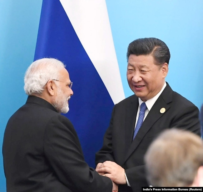 Narendra Modi dhe Xi Jinping në një nga samitet e mëparshme të SCO-së në Qingdao, Kinë në vitin 2018