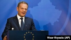 European Council President Donald Tusk speaks at a press conference after a meeting with Kosovo's president in Pristina on April 26.