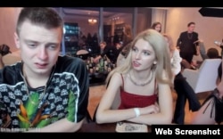 Trash-streamer Mellstroy (Andrei Burim) with Instagram model Alyona Yefremova during one of his broadcasts at Moscow's Federation Tower, seconds before he assaulted her.