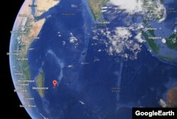 محل جزیره «رئونیون» در اقیانوس هند و در نزدیکی ماداگاسکار. مالزی و استرالیا در سمت راست نیمکره قرار دارند