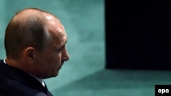 U.S. -- Russian President Vladimir Putin waits to deliver his address during the 70th session of the United Nations General Assembly at UN headquarters in New York, September 28, 2015