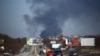 Дым от пожара на складе завода пластмасс, Симферополь, 20 февраля 2019 года