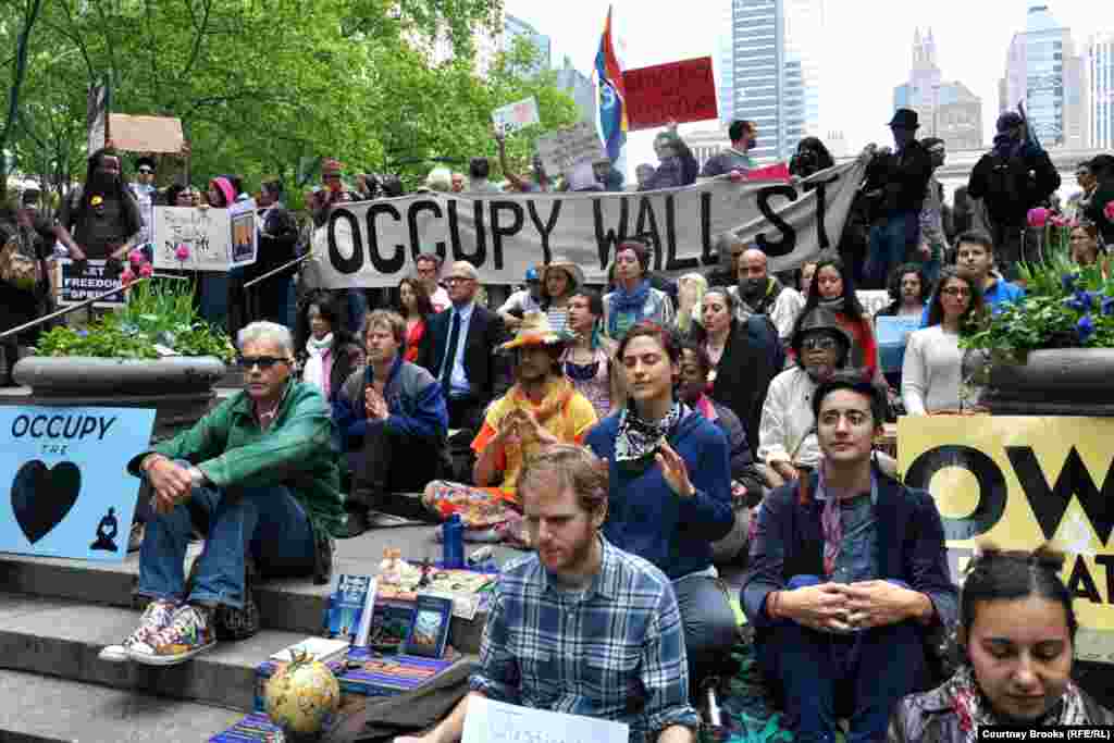 Protesters meditate in New York City&#39;s Bryant Park.