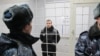 Геннадій Афанасьєв дає свідчення через відеозв'язок
