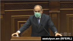Prime Minister Nikol Pashinian speaks at the National Assembly on May 27