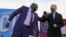 Raphael Warnock dhe Joe Biden. 