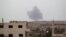Smoke rises from a base controlled by rebel fighters from the Ahrar al-Sham Movement that was targeted by what activists said were Russian airstrikes in Syria's Idlib Province on October 1.