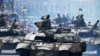 Tanks ride along Khreshchatyk Street during a military parade to celebrate Independence Day in Kyiv.