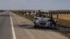 Спалене російськими дронами авто на трасі Херсон-Миколаїв, липень 2025 року