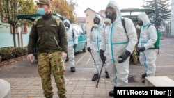 An elementary school in Oroshaza is disinfected after a registered case of COVID-19 on October 24.