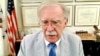 United States - former US national security adviser John Bolton speaking to RFE/RL - screen grab