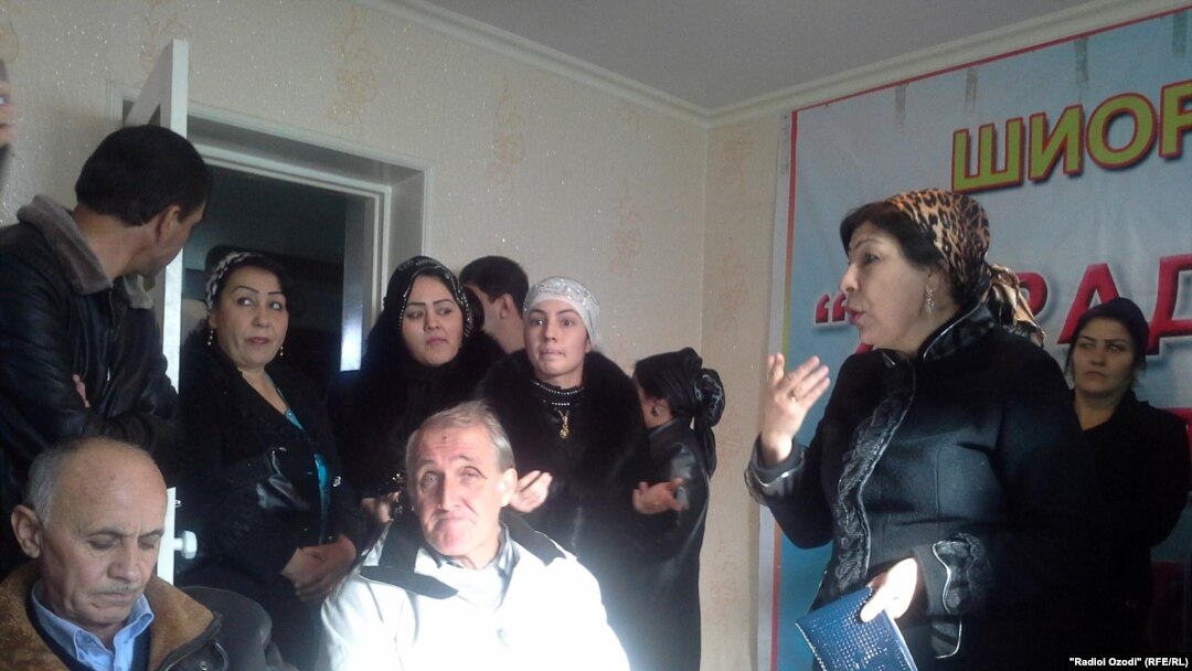 A screen grab of a video showing a group of women disrupting an opposition party's press conference in Dushanbe.