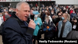 Mikalay Statkevich speaks during a rally in support of opposition politicians seeking to become presidential candidates in Minsk on May 24.