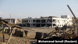 A damaged hospital is seen at the site of an attack in a U.S. military airfield in Bagram, north of Kabul in December.