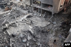 ساختمان‌های ویران‌شده در نصیرات غزه در پی عملیات ضربتی ارتش اسرائیل برای نجات چهار شهروند ربوده‌شدۀ اسرائیلی که ظهر ۱۹ خرداد با موفقیت انجام شد