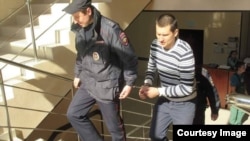 Павел Степанченко после задержания, архивное фото