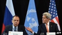 U.S. Secretary of States John Kerry (right) gestures beside of Russian Foreign Minister Sergei Lavrov during a news conference after the International Syria Support Group (ISSG) meeting in Munich on February 12.