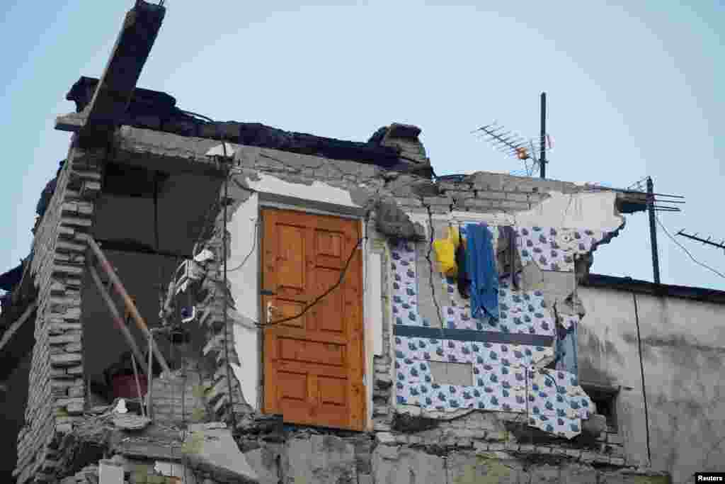 Detail of a collapsed residential building in Thumane. The U.S. Geological Survey said the earthquake hit at an approximate depth of 20 kilometers.