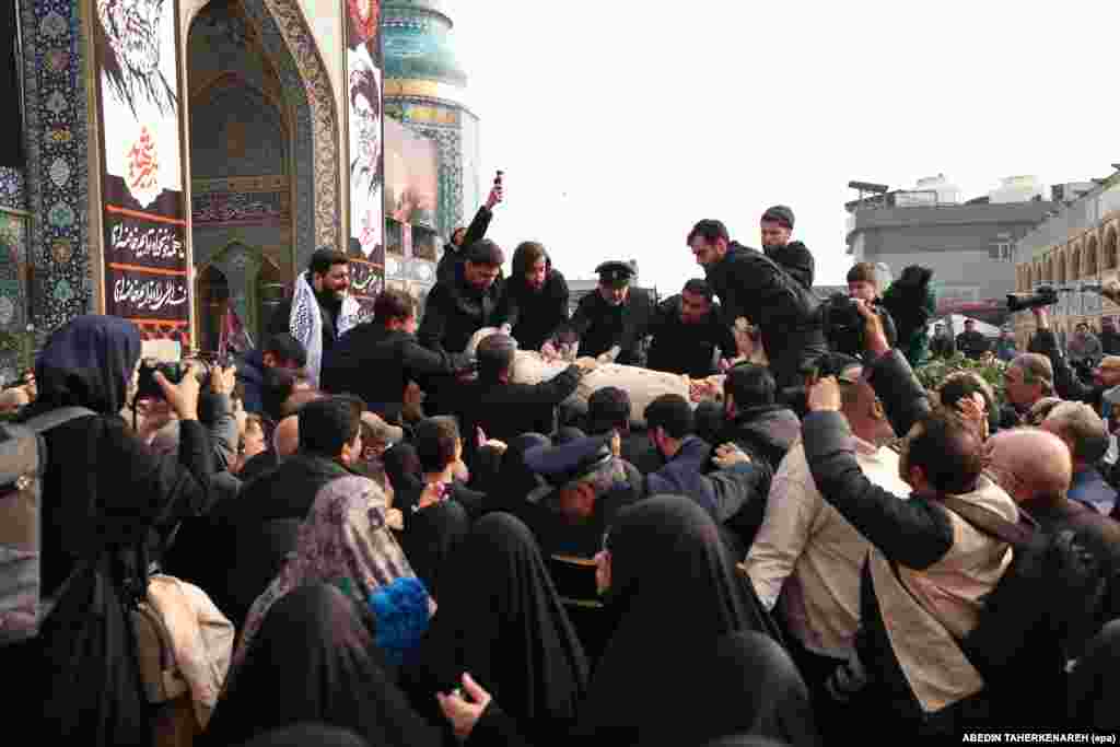 Mourners carry the wrapped body of Ali Shamkhani during his funeral in Tehran on March 14. Shamkhani was a key figure in Iran’s security and nuclear policymaking. He was killed in an Israeli strike on February 28.
