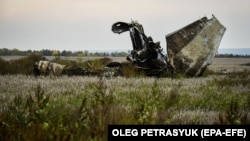 Обломки российского боевого самолета, сбитого ранее ВСУ недалеко от города Изюма Харьковской области, 30 сентября 2022 года