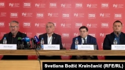 Darko Mladić (prvi slijeva), do njega ministar pravde Srbije Nenad Vujić na konferenciji za novinare, Beograd, 4. septembar 2026.