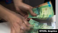 Қазақстан валютасы, теңге. (Көрнекі сурет).