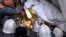 An 11-month-old baby is saved from the rubble of the collapsed building in Magnitigorsk.