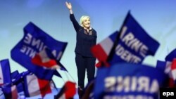 France -- Marine Le Pen, the leader of France's far-right Front National political party and candidate for the 2017 French presidential elections, waves to cheering supporters during a presidential campaign rally in Metz, March 18, 2017