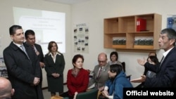 Armenia -- Prime Minister Tigran Sarkisian (L) and U.S. Ambassador Marie Yovanovitch (C) meet with beneficiaries of U.S. assistance provided under the Millennium Challenge Account program, 15Apr2011.