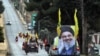 Lebanon -- Supporters of the Shiite Hezbollah movement drive in a convoy in support of its leader Hassan Nasrallah's speech, in the area of Fatima's Gate in Kfar Kila on the Lebanese border with Israel on October 25, 2019. - Tensions rattled Lebanon's nin